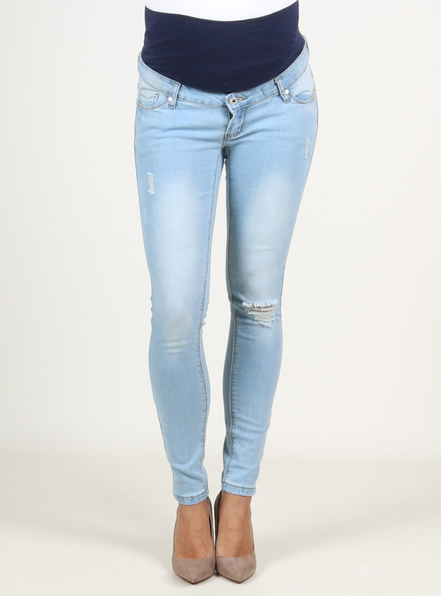Jeans slim con rotos y barriga baja